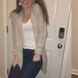 tan and white cardigan